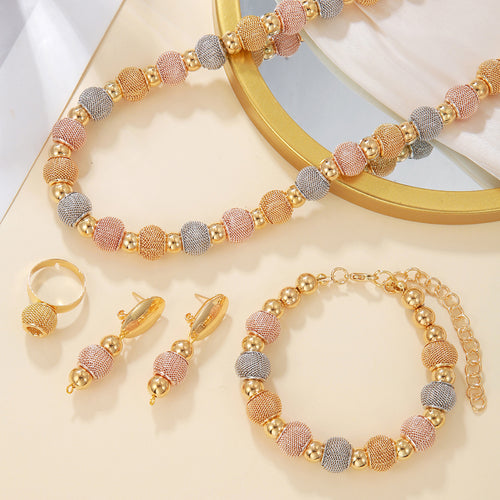 Two-tone gold bead jewelry set detail